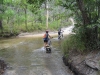 Cooling the feet of at another creek crossing. While pleasant for us the bikes didn\'t take too well to regular water immersion.