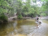 Ed crossing the beautiful Dulhunti River on the Overland Telegraph Track. There\'s some nice camping on both sides of the river but it\'s a popular spot.