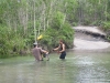 Crossing the belly button deep Bridge Creek. Many a vehicle has come to grief here by sucking water into the motor.