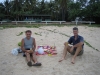 Celebrating Ed\'s birthday on the Seisia beach in front of our campground. No expense was spared as we wined and dined in great style.